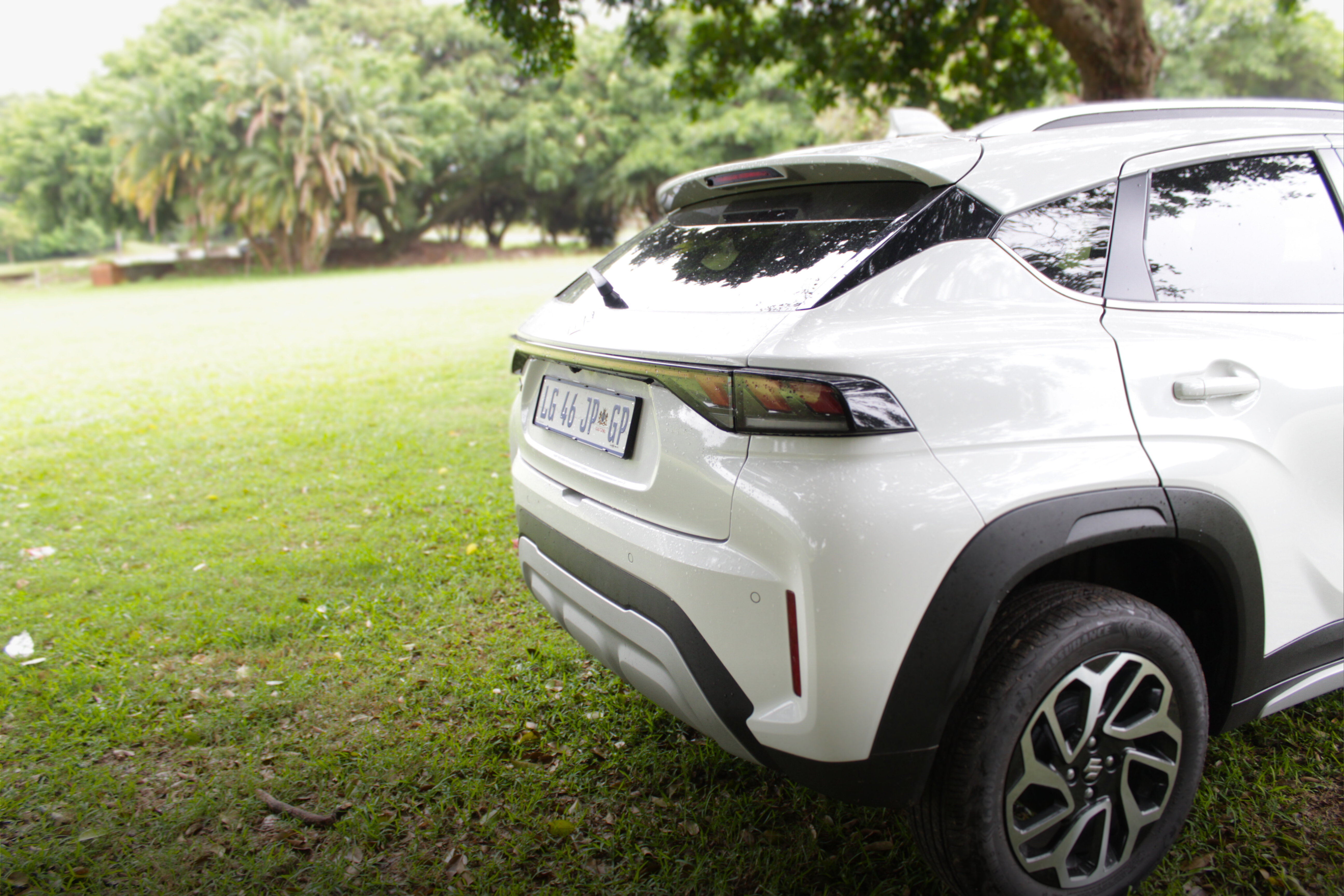 Rear shot of the Suzuki Fronx on green grass