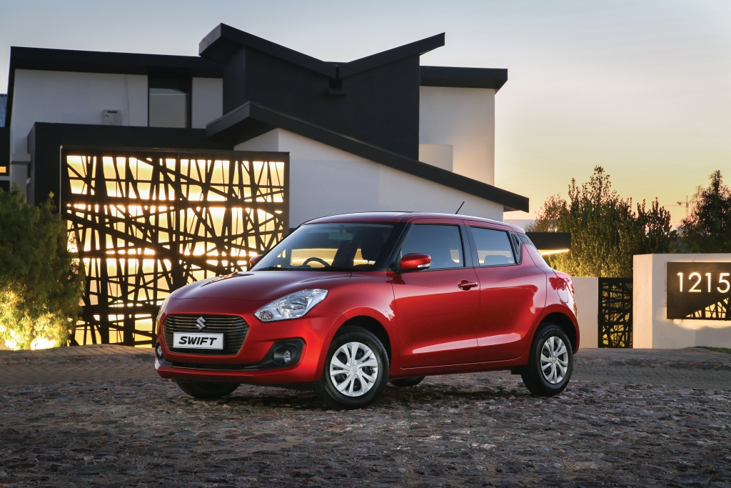 Red Suzuki Swift student car