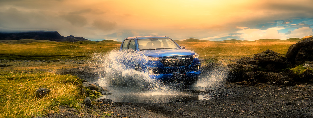 The all new Foton Tunland driving through a rivier