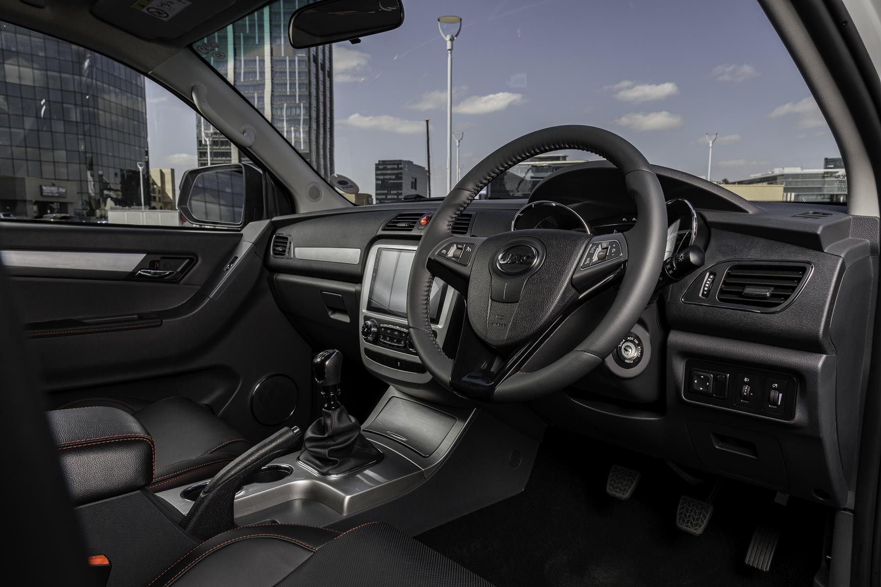 Driver's side interior view of the JAC Motors T8 double-cab