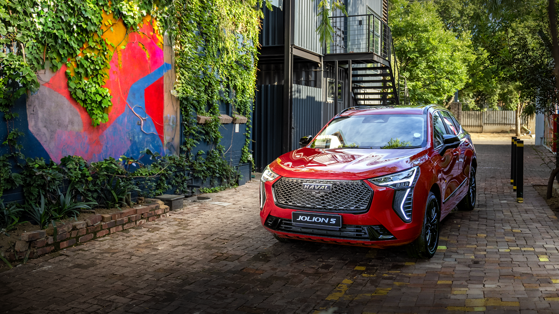 A red Haval Jolion S car