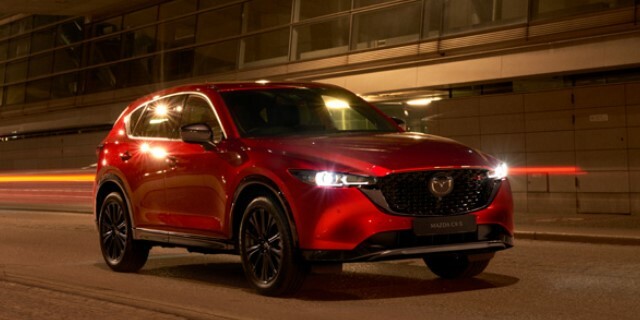 Mazda CX-5 front view with lights on