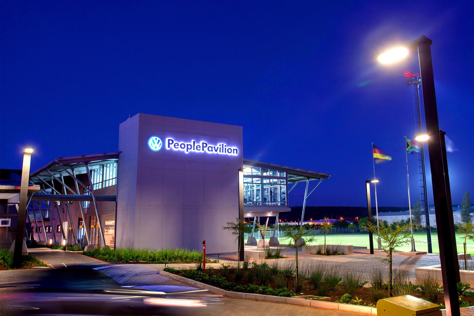 PeoplePavilion at Volkswagen with lights on at night