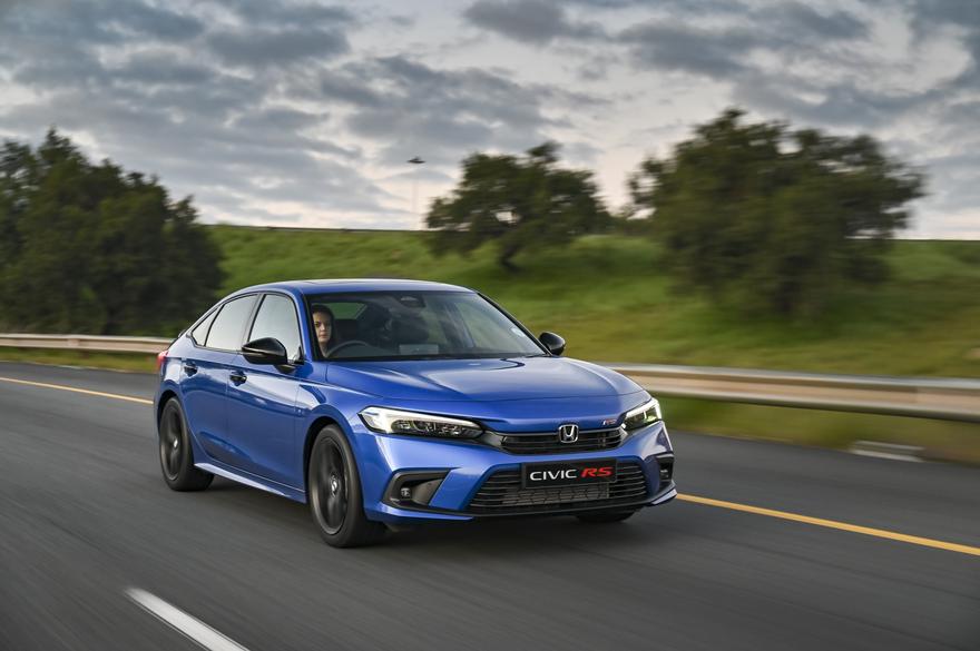 A blue Honda Civic RS on the road