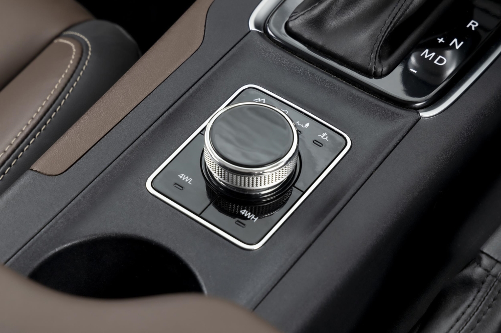 AWD Mahindra Scorpio-N variants receive this four-position terrain response dial, along with 4H and 4L selection buttons.