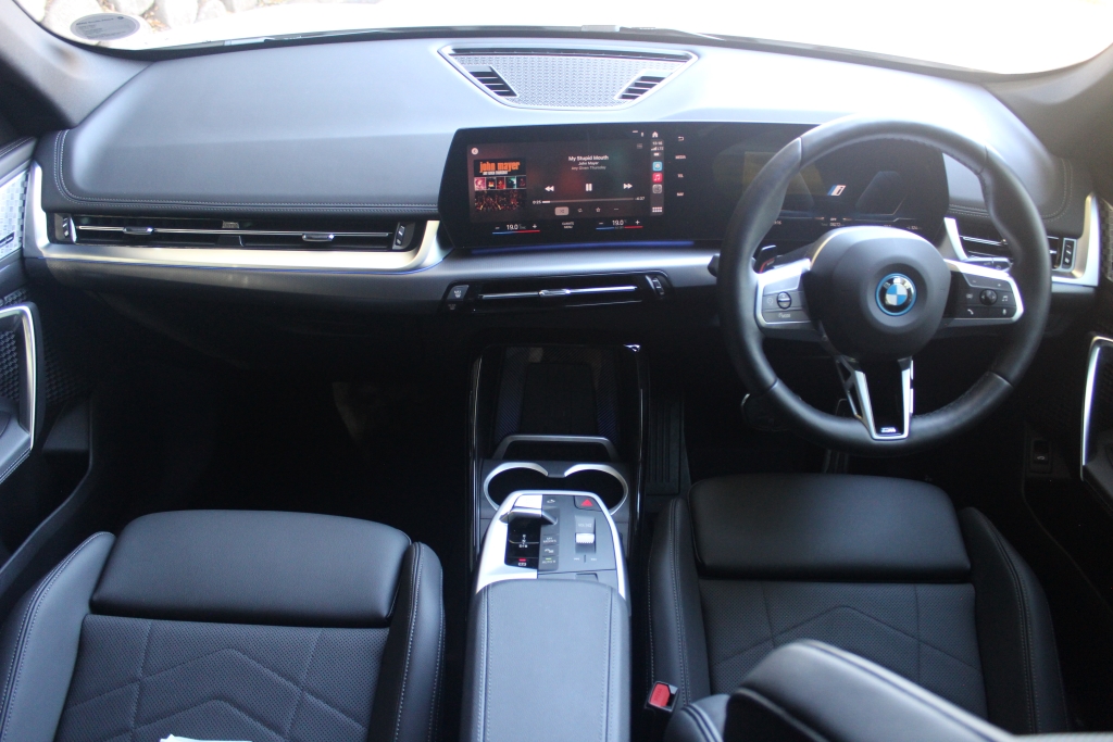 The new BMW iX1 has an elegant interior design, with high-quality materials and solid assembly. It looks good, too.