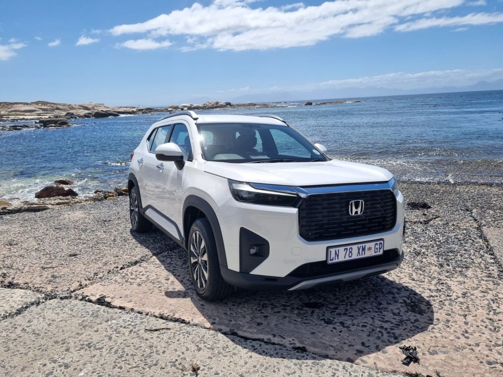 White Honda Elevate near the beach