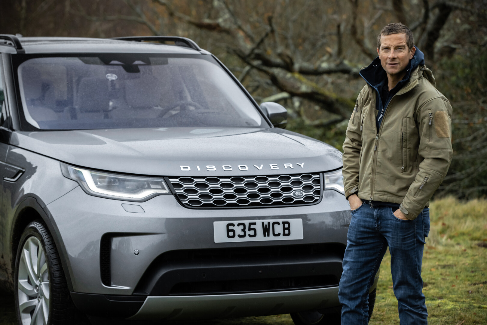 Land Rover Discovery front view with man