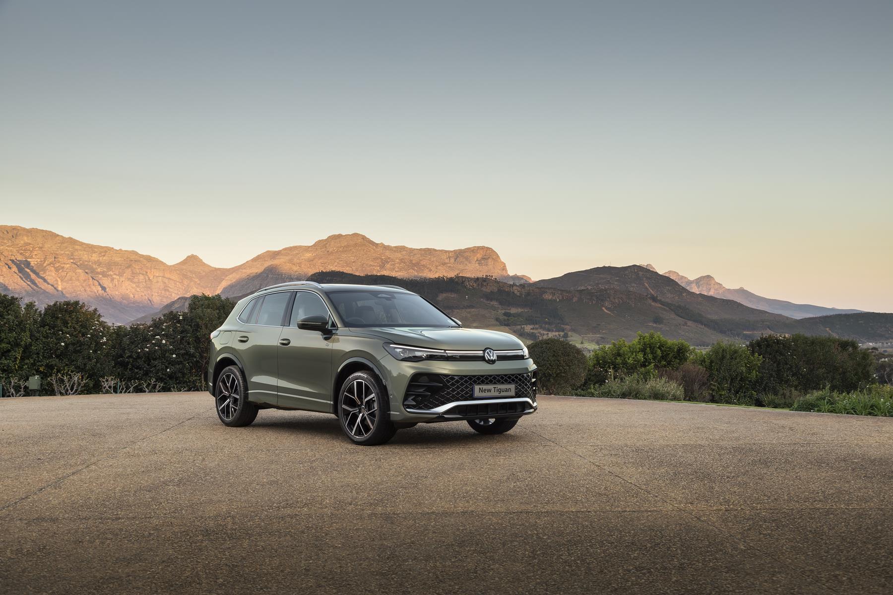 Volkswagen Tiguan front view with mountain background