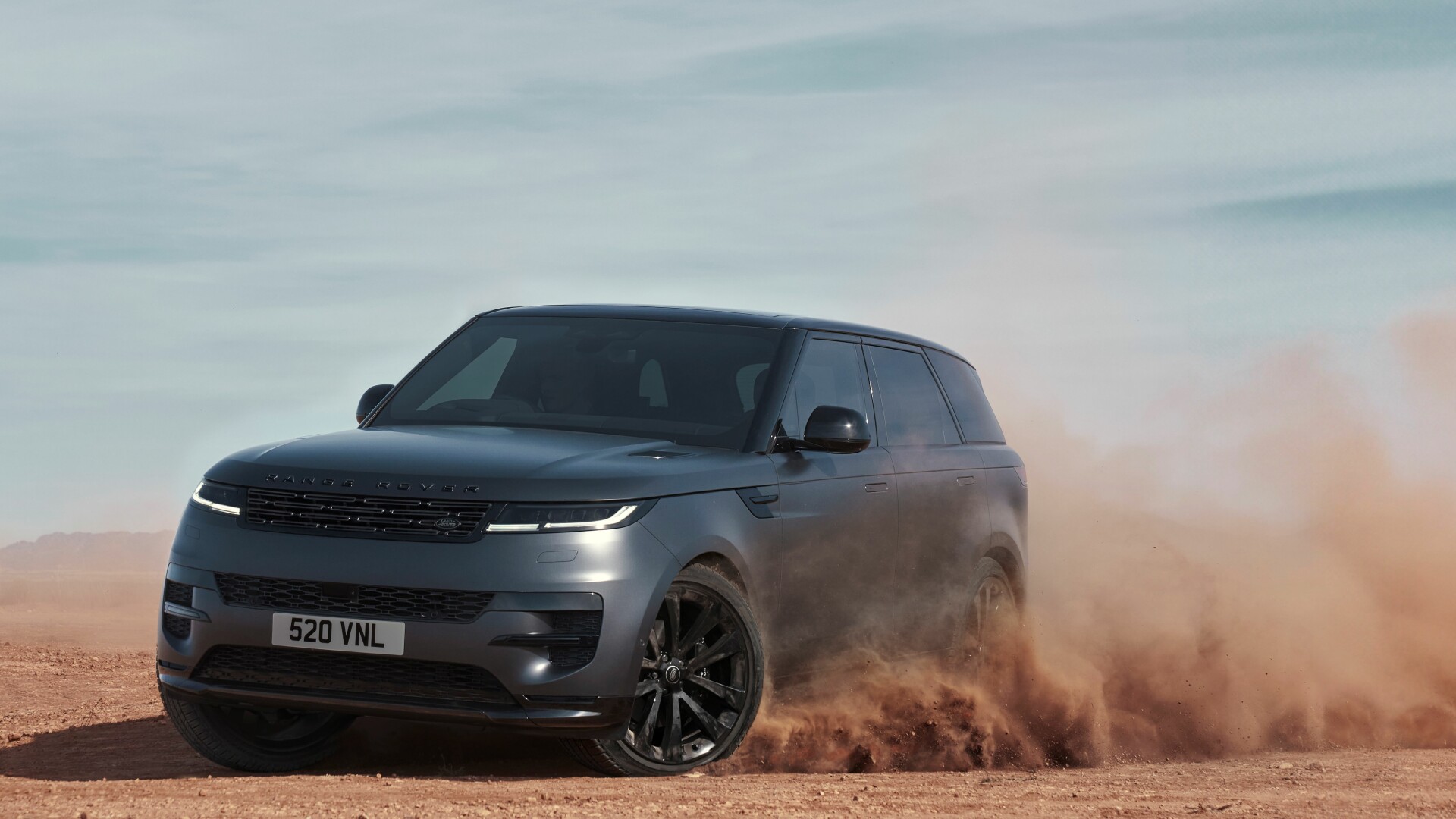 Range Rover Sport driving in the sand