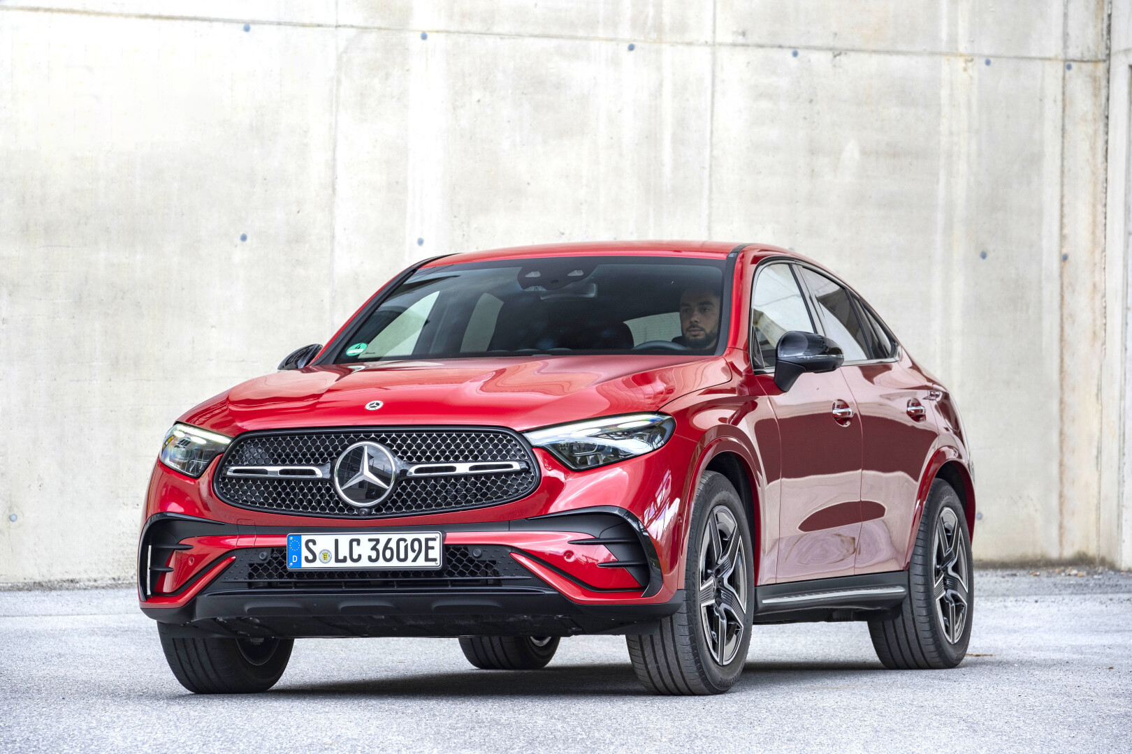 A red Mercedes-Benz sports car